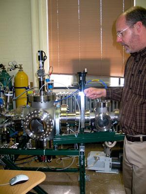 NPRE Prof. Brent Heuser with the nearly constructed magnetron sputtering system.