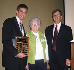 Award winner Eric Stein, former NPRE secretary Catherine Pritchard, and Jim Stubbins