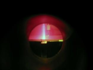 Photo of the electron beam as it strikes the liquid metal target.