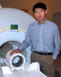 Ling Jian Meng with his hybrid nuclear imaging device.