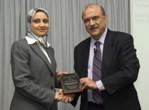 Zahra Mohaghegh, left, receiving the George Apostolakis Fellowship Award from the International Association of Probabilistic Safety Assessment and Management (PSAM).