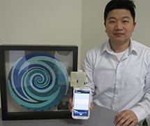 Assistant Prof. Liu with the MoboSens sensor and Vodafone award. Liu and the MoboSens team were recognized at the Vodafone Wireless Innovation Project awards ceremony and Global Philanthropy Forum at Silicon Valley on April 16.