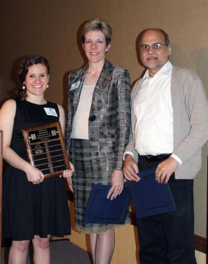 ANS President Molly Bilderback presents the 2013 Teacher of the Year Award to Profs. Clair Sullivan and Rizwan Uddin.