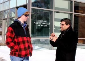 Mike Lively and J.P. Allain outside the Micro and Nanotechnology Laboratory, which houses Allain