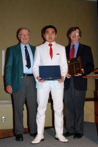 Emeritus Prof. George Miley, Brandon Lee, and Department Head Jim Stubbins