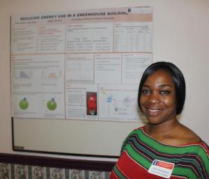 Olasunkanmi Atinuke Ogunbayo with a poster on her project.