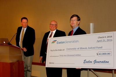 From left, Exelon representatives Ed McVey and Bruce Rash present NPRE Department Head Jim Stubbins Exelon's ceremonial check for the Axford Fund.