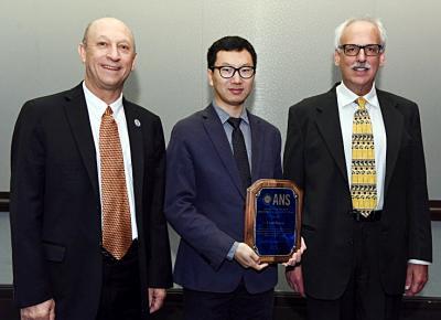 From left, ANS President Andy Klein, NPRE Assistant Prof. Yang Zhang, and ANS Awards Chair Tom Sutton