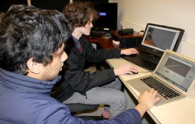 Nolan Stelter and Arnav Das, working in the Virtual Education and Research Laboratory.