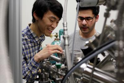 Michael Toriyama and Josh Devorkin, working in Prof. JP Allain's Radiation Surface Science and Engineering Laboratory