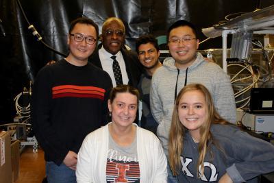 Chancellor Robert Jones toured CPMI in April and visited with the post-docs and students working on the plasma torch project. Sitting, from left, are post-doc Lucia Bonova and Lauren Excell (Civil Engineering). Standing, from left, are post-doc Chisung Ahn, Jones, Nirbhav Chopra (Physics) and NPRE undergrad Daniel In.