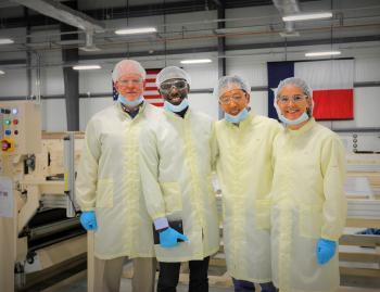 Chinedu Oputa, second from left, while working over the summer on the Texas Military Department project.