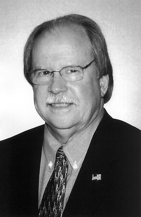 John W. Melvin