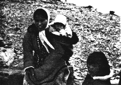 Eskimo mother with children