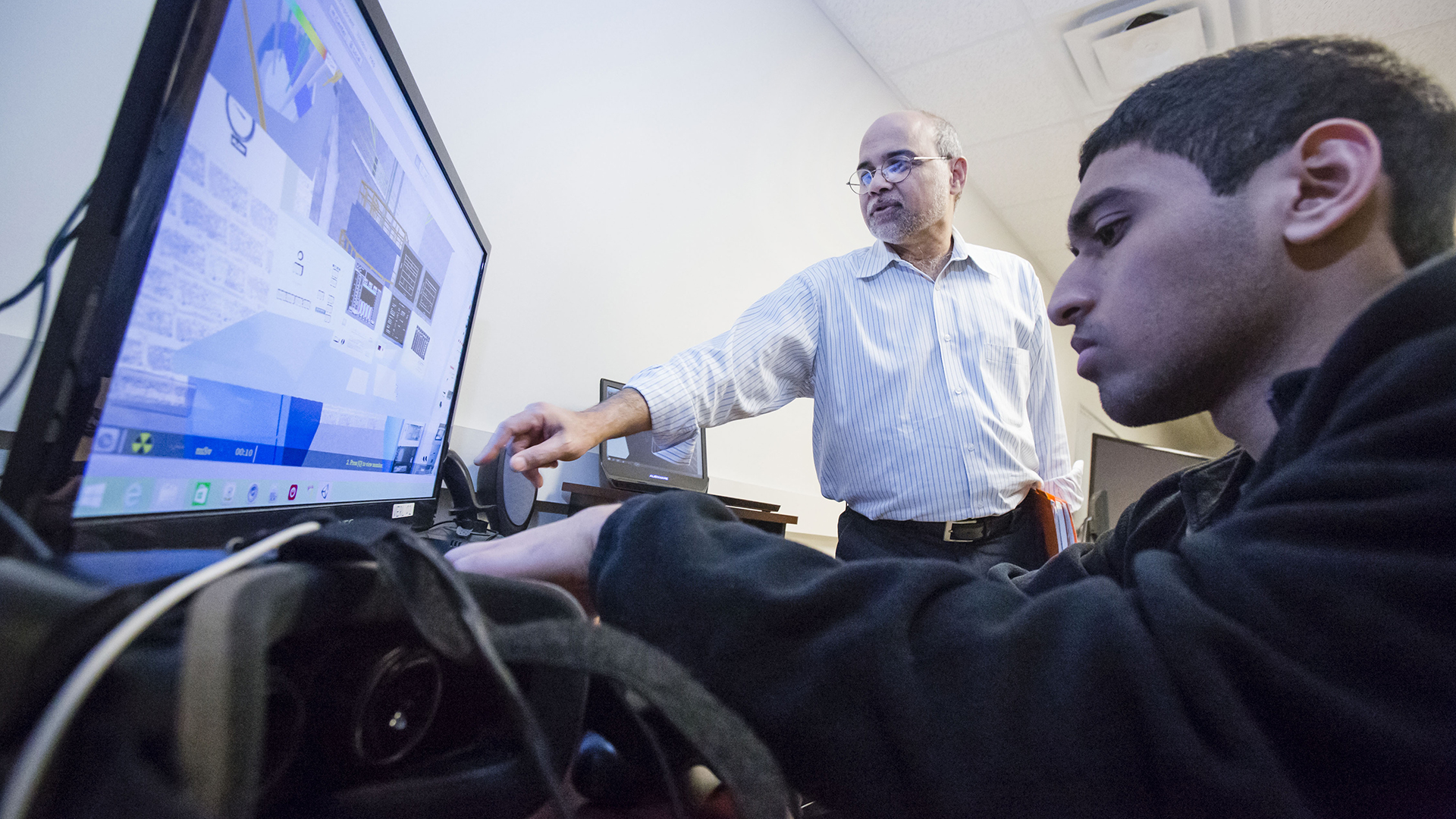 Campus honors Uddin with Excellence in Guiding Undergraduate Research Award