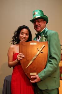 Connie Kim, recipient of a $15,000 Kirkwood Scholarship, receiving the coveted Knight of St. Patrick award.