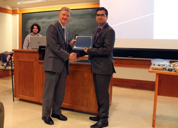 Prof. Seebauer awards Saurabh Shukla second place for the oral presentation.