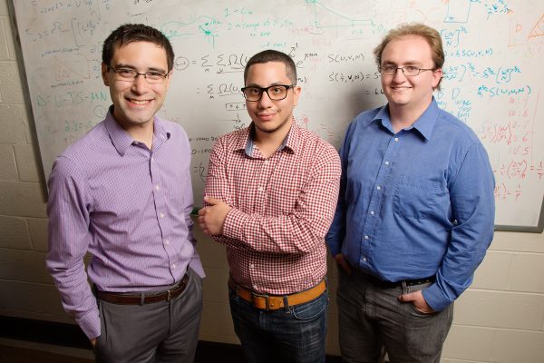 (from left) Charles Sing, professor of theoretical and computational polymer physics; graduate student Jason Madinya; and graduate student Tyler Lytle.