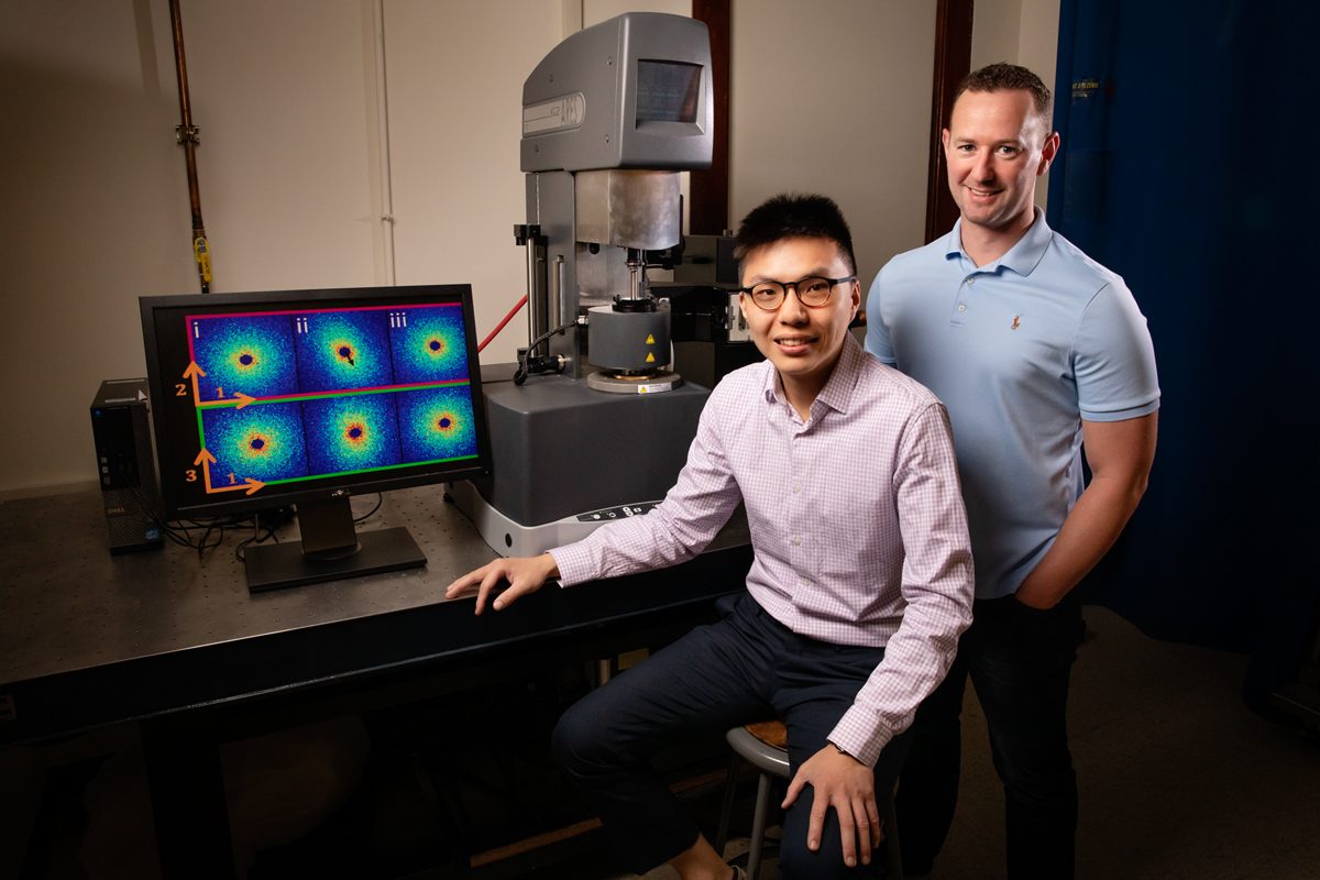 Chemical and Biomolecular Engineering graduate student Johnny Ching-Wei Lee (left), Professor Simon Rogers (right) and collaborators are challenging previous assumptions regarding polymer behavior with their newly developed laboratory techniques that measure polymer flow at the molecular level. Photo by L. Brian Stauffer.