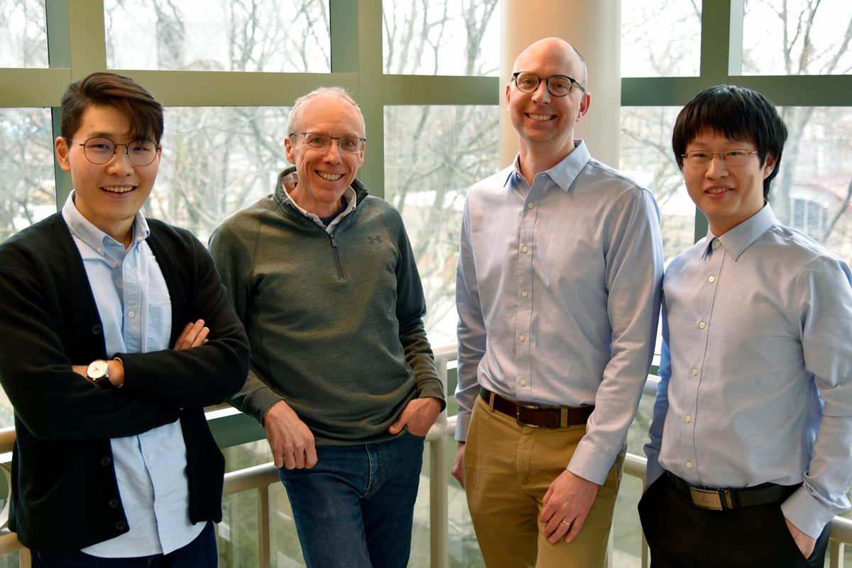 From left, Hao Yu, graduate student in chemical and biomolecular engineering; Jeff Moore, professor of chemistry; Charles Schroeder, professor of chemical and biomolecular engineering; and Songsong Li, graduate student in materials science and engineering.
