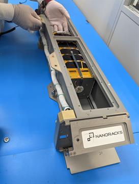 The CAPSat nanosattelite installed into the Nanoracks CubeSat deployer. Photo courtesy of Illinois Aerospace Engineering