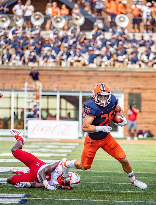 Fred Zwicky/U of I Public Affairs&lt;br /&gt;Illinois running back Mike Epstein (26) breaks a tackle as the Fighting Illini Football team defeat the Nebraska Cornhuskers 30-22 at Memorial Stadium on Oct. 29. One of Statt's research efforts may help improve football players' helmets by helping them help absorb impact energy.