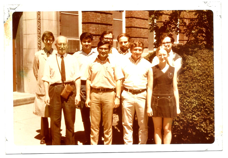 Sanak Mishra, front row, second from left, is all smiles with his thesis advisor professor Paul Beck, first row, left, and laboratory-mates in front of the Materials Science and Engineering building on Green Street in Urbana, Ill. in 1969.
